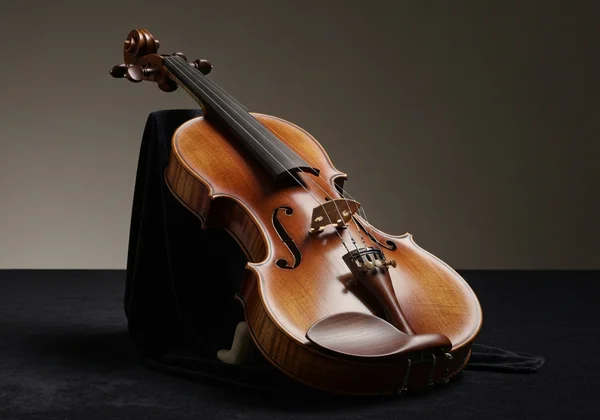 Person using an online tuner for violin